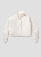 White fleece jacket on a light gray background