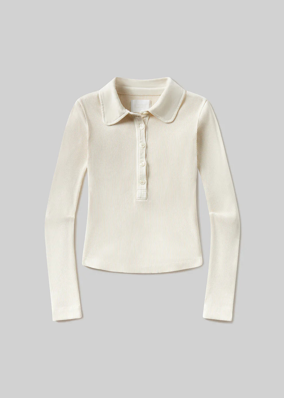 White long-sleeve shirt with collar on a gray background