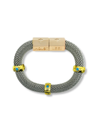 Bracelet with gold and silver design on a white background