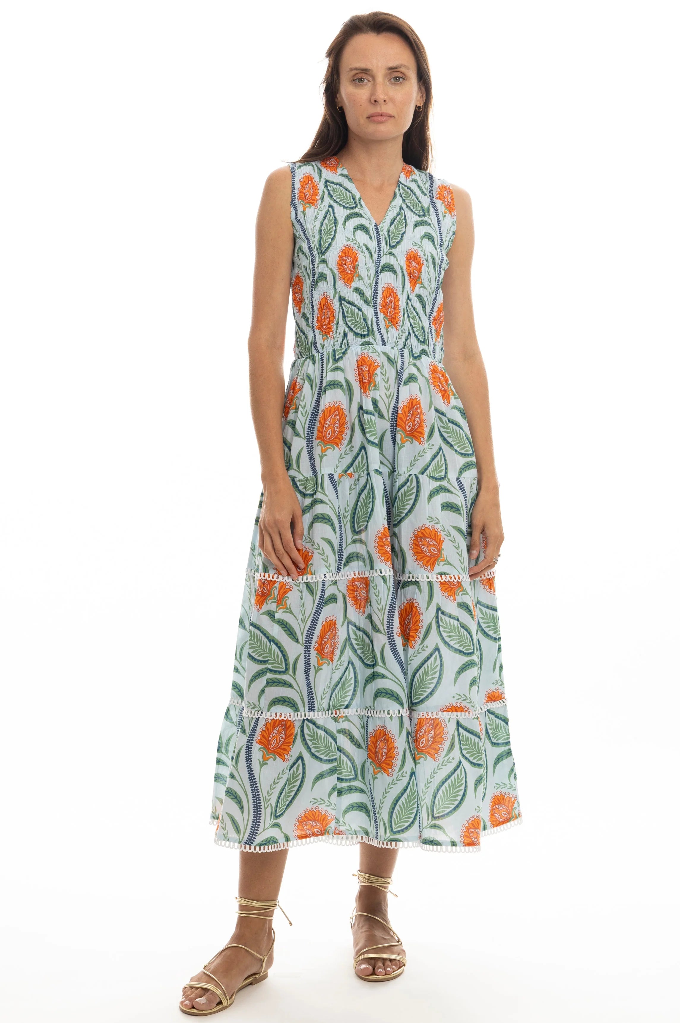 Woman wearing a floral dress on a white background