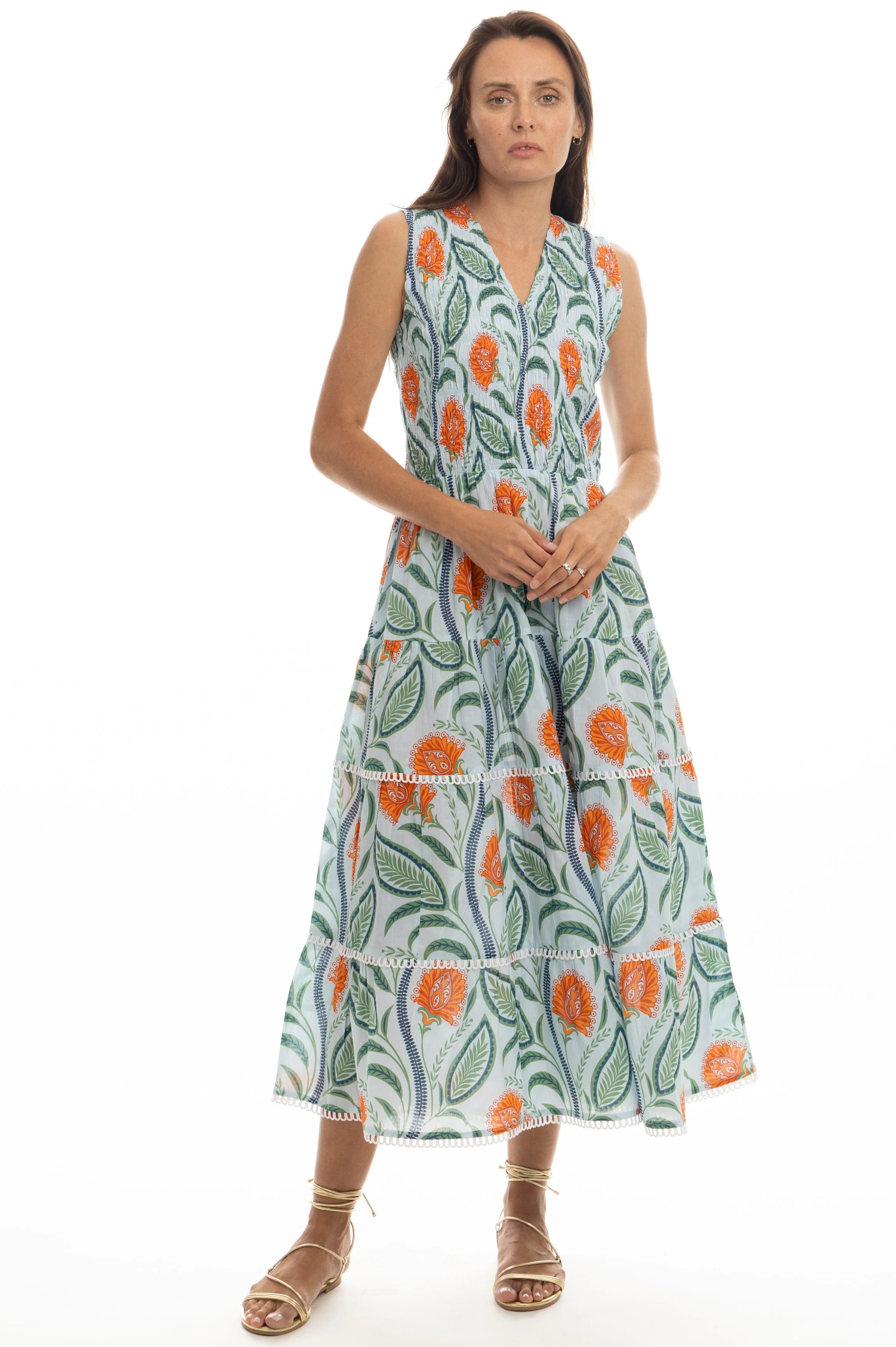 Woman wearing a floral dress on a white background