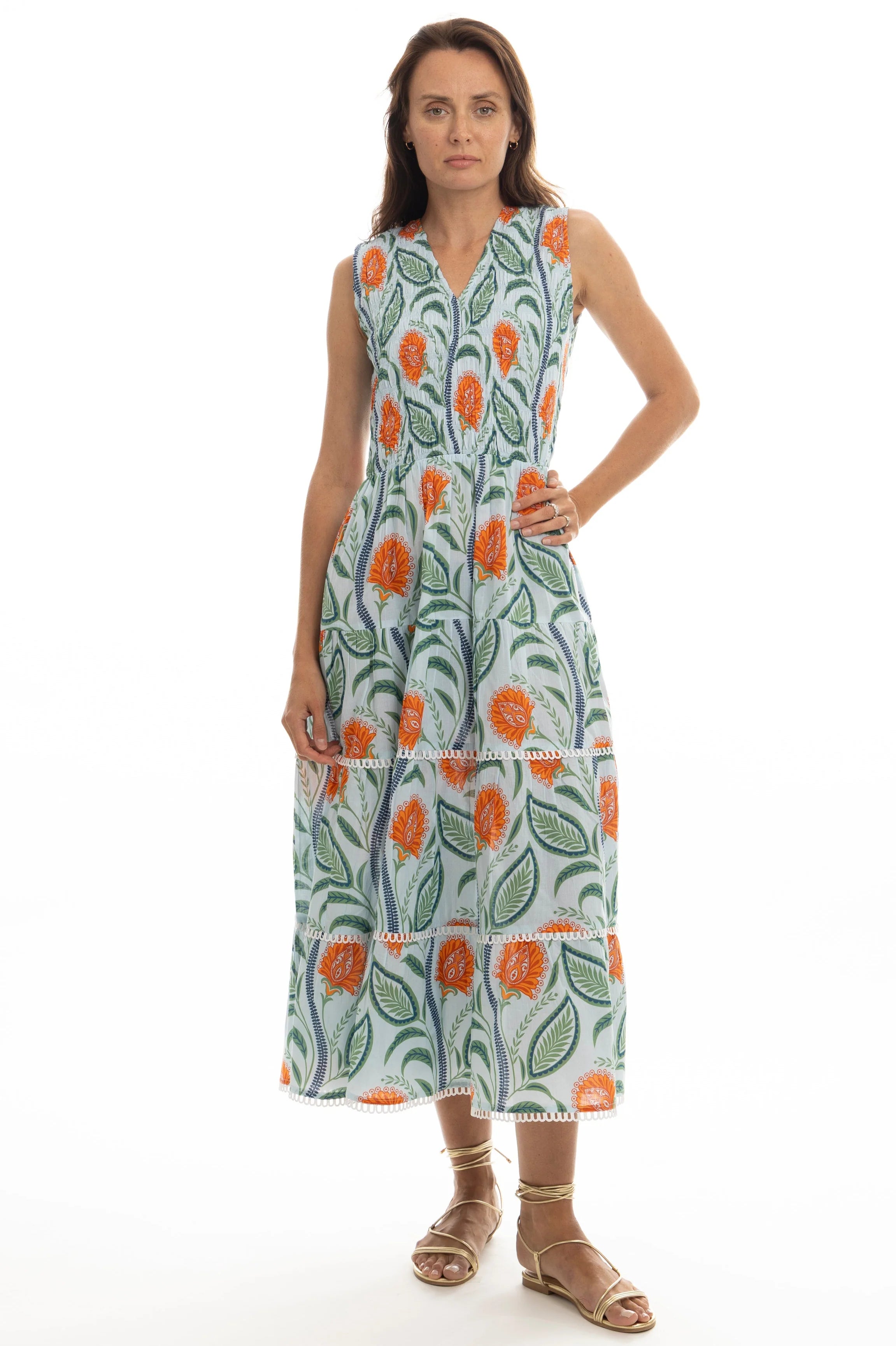 Woman wearing a floral dress on a white background