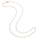 Gold chain necklace on a white background