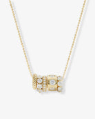 Gold necklace with diamond beads on a white background