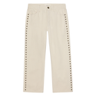 Beige pants with decorative studs on a white background
