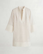Beige linen shirt on a light gray background