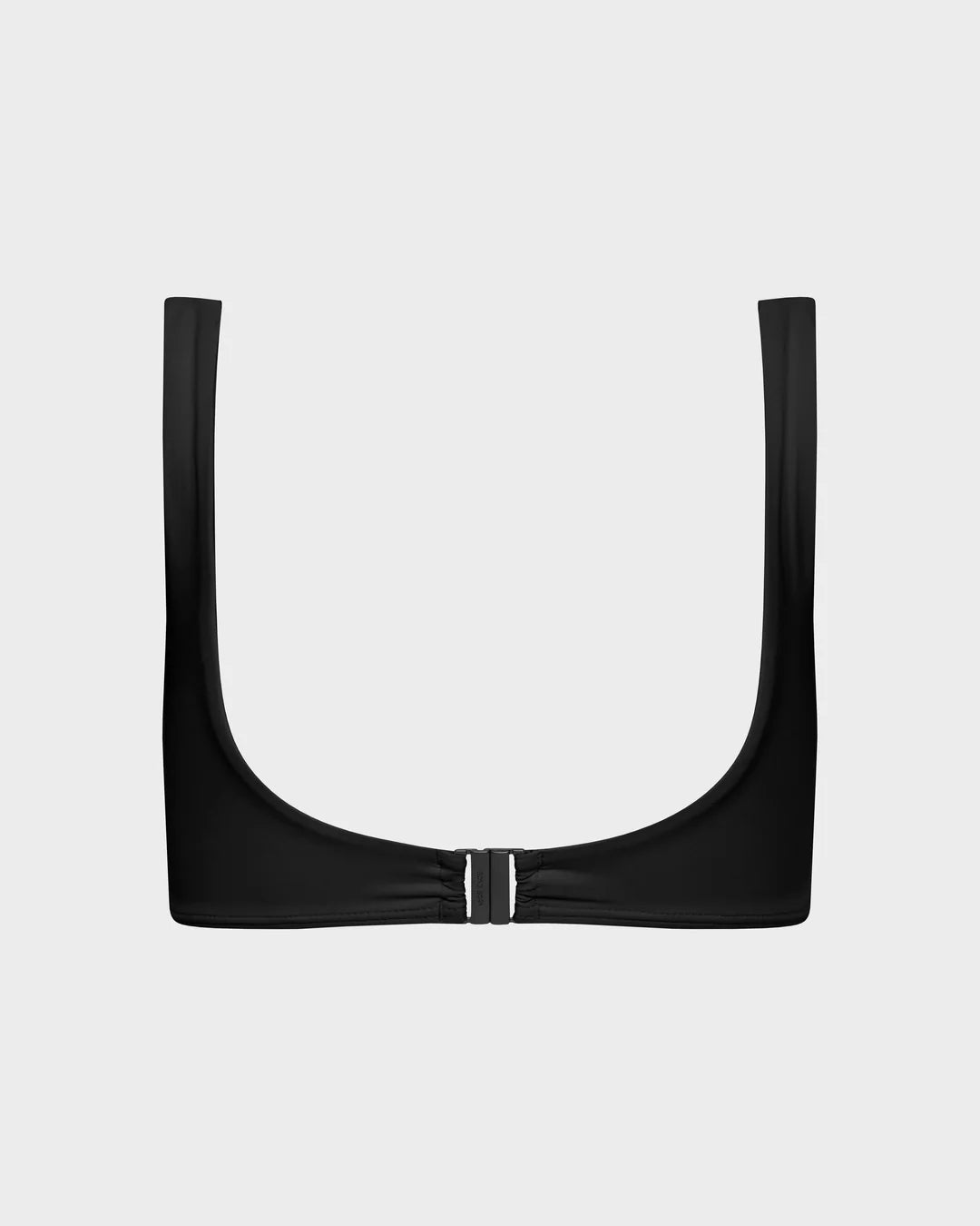 Black bikini top with a bow detail on a light gray background