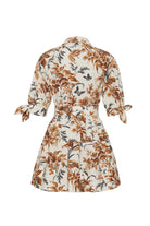 Floral dress with brown and black patterns on a white background