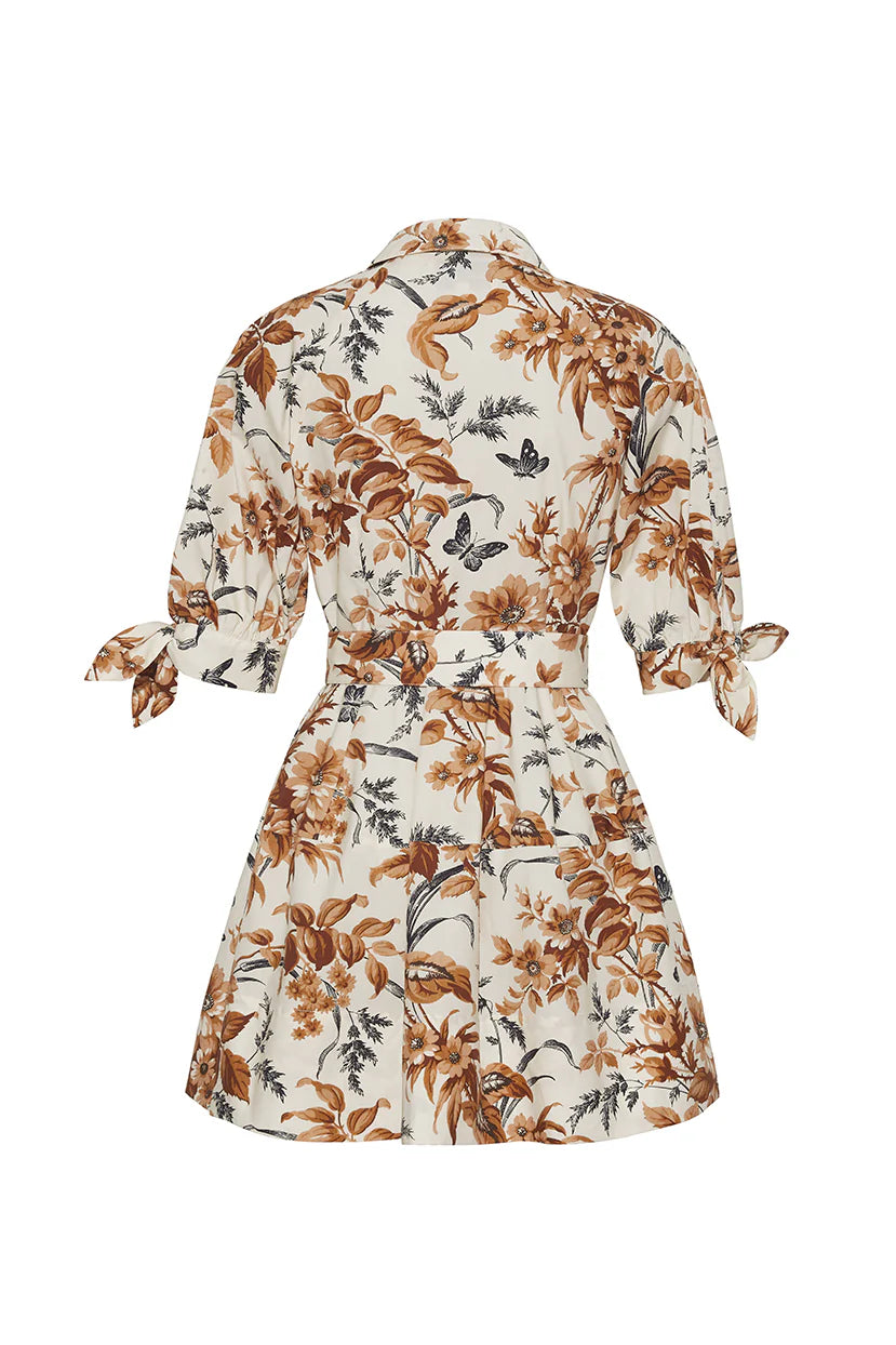 Floral dress with brown and black patterns on a white background