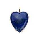 Heart-shaped lapis lazuli pendant with gold accents on a white background