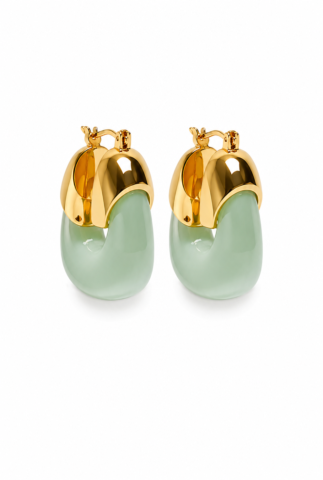A pair of gold hoop earrings with smooth, curved light green stone-like drops, shown on a clean white background.