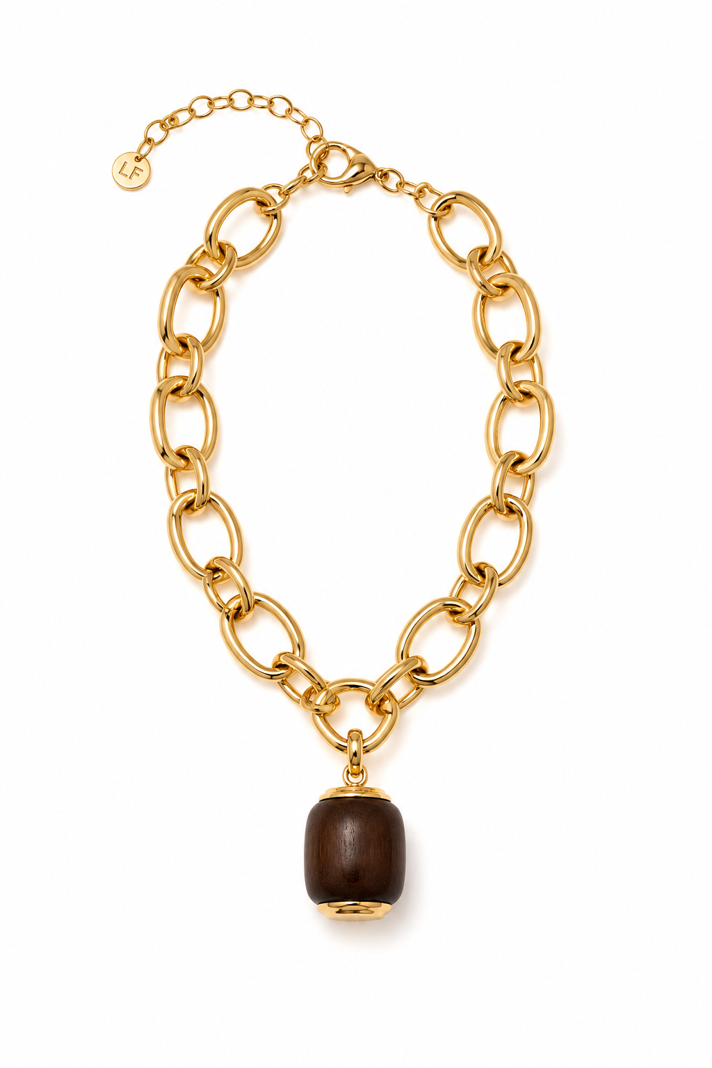 A gold-tone chain necklace with a large oval link design and a dark brown cylindrical pendant, shown on a plain white background.