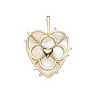 Gold heart-shaped pendant with a smaller heart in the center on a white background