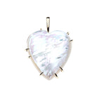 Heart-shaped pendant with a white stone on a white background