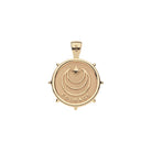 Gold pendant with 'Courage' engraving on a white background