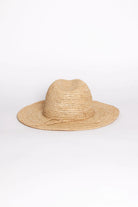 Beige straw hat on a white background
