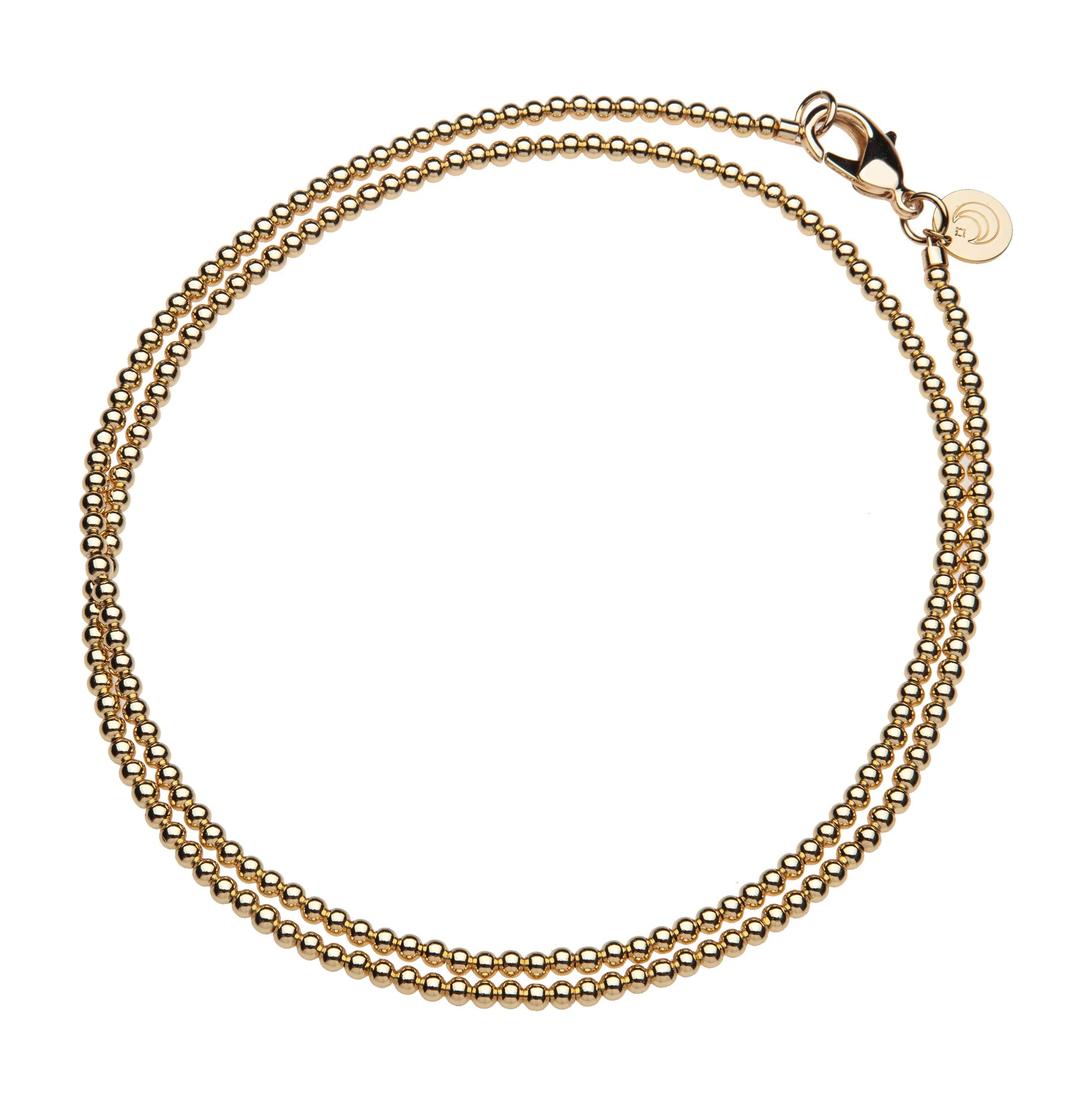 Gold chain bracelet on a white background