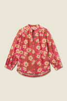 Floral blouse with pink background