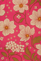 Floral pattern with large flowers on a pink background