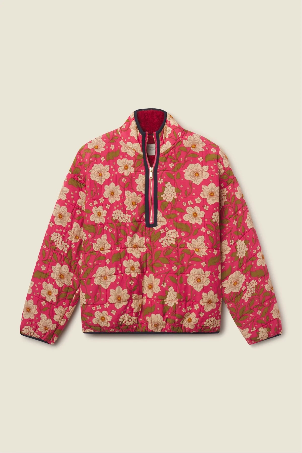 A pink quilted jacket with a floral print, featuring a half-zip front with a dark red lining and a black zipper pull, displayed flat against a light beige background.