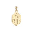 Gold pendant with 'HAVE FAITH' engraving on a white background