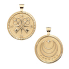 Two gold pendants with intricate designs on a white background