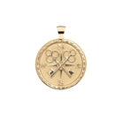 Gold compass pendant on a white background