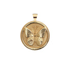Gold butterfly pendant on a white background
