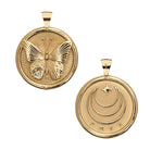 Two gold pendants with intricate designs on a white background