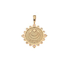 Gold pendant with moon and star design on a white background