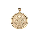 Gold pendant with 'Gratitude' engraving on a white background