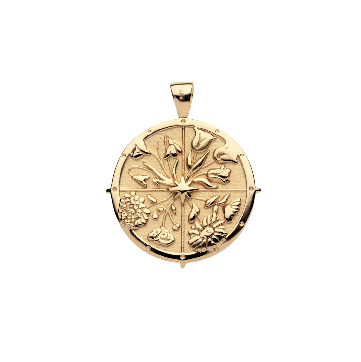 Gold compass pendant with floral designs on a white background
