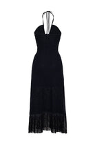 Black dress with fringe details on a white background