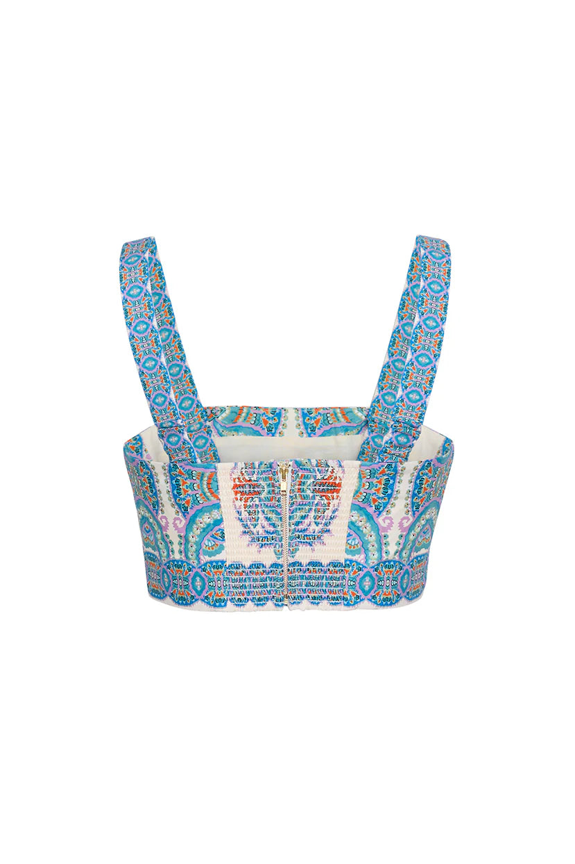 Multicolored patterned top on a white background
