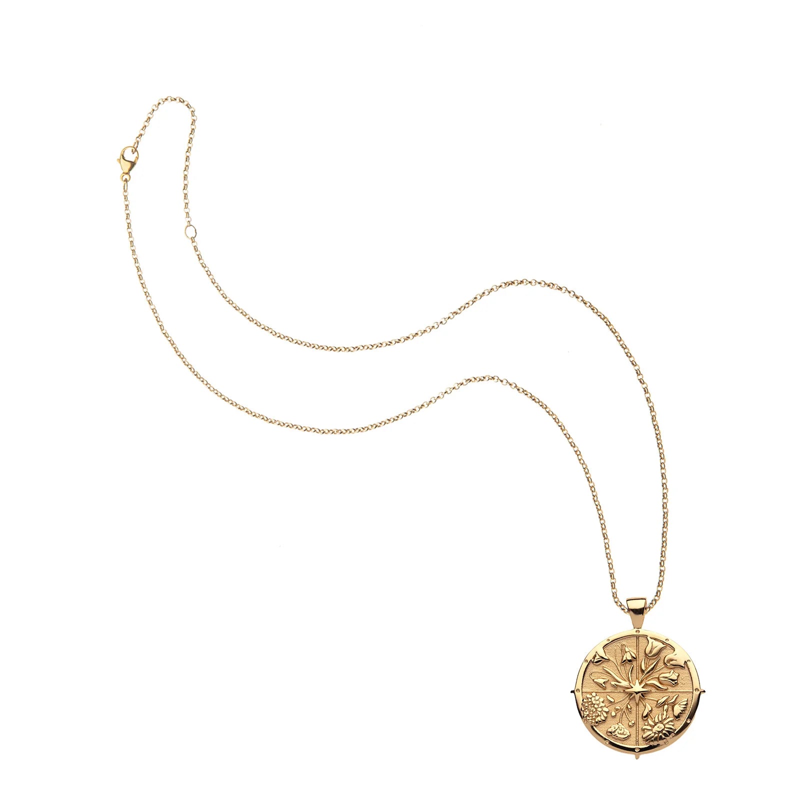 Gold necklace with a decorative pendant on a white background