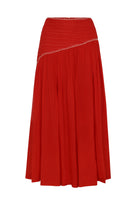 Red skirt with white trim on a white background
