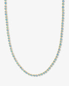 Necklace with blue gemstones on a white background