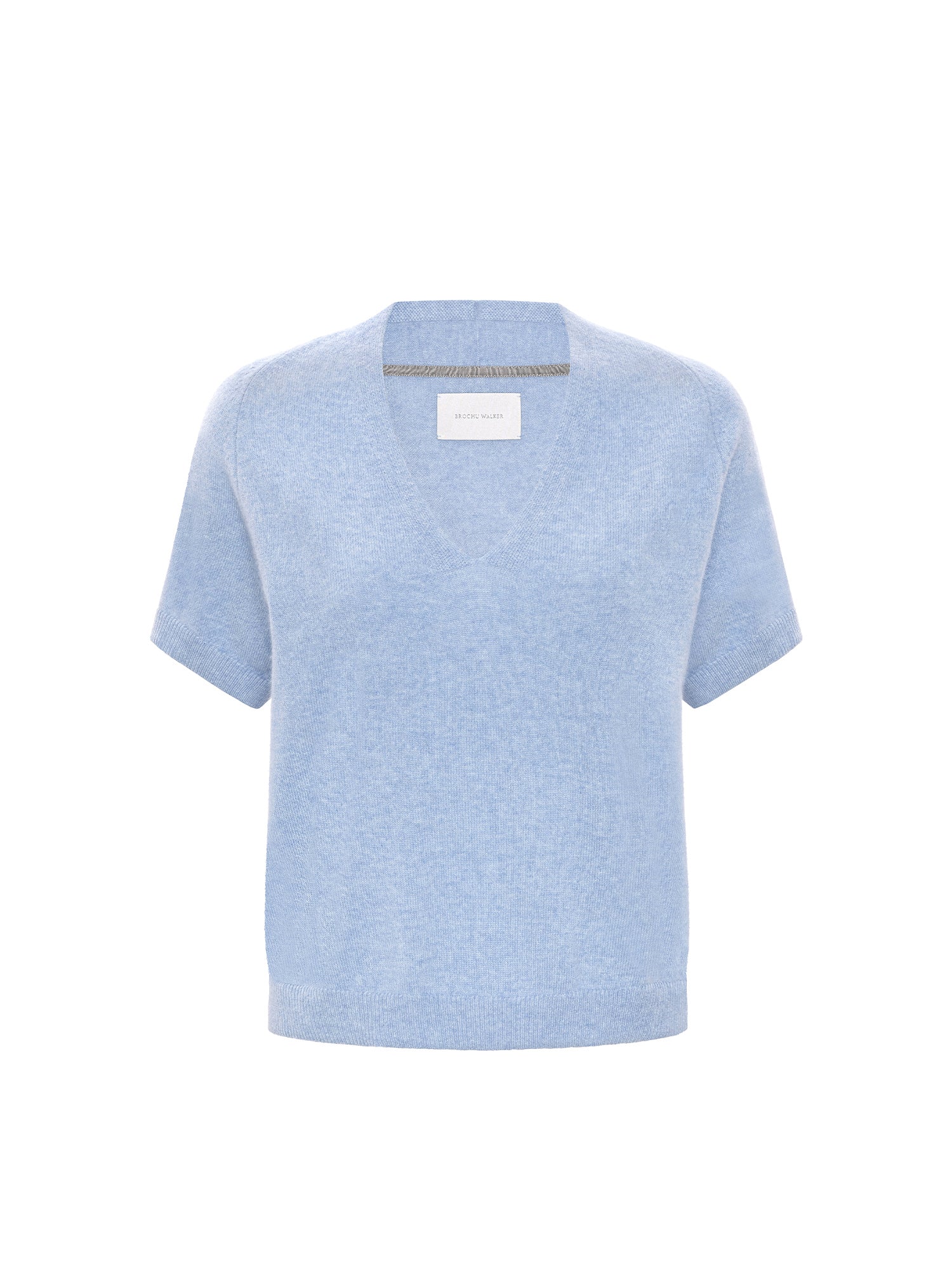 A light blue short-sleeve knit top with a crew neck and a small white brand label at the collar, shown on a plain white background.