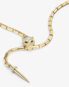 Gold necklace with panther head design on a white background