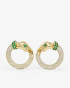 Gold hoop earrings with green gemstones on a white background