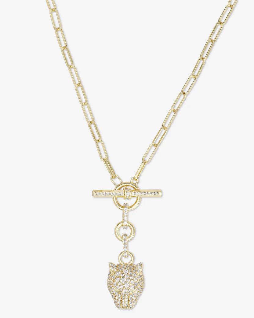 Gold necklace with a paw-shaped pendant on a white background