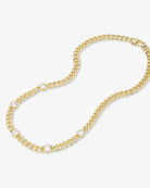 Gold chain necklace on a white background