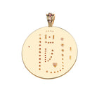 Gold pendant with gemstones on a white background