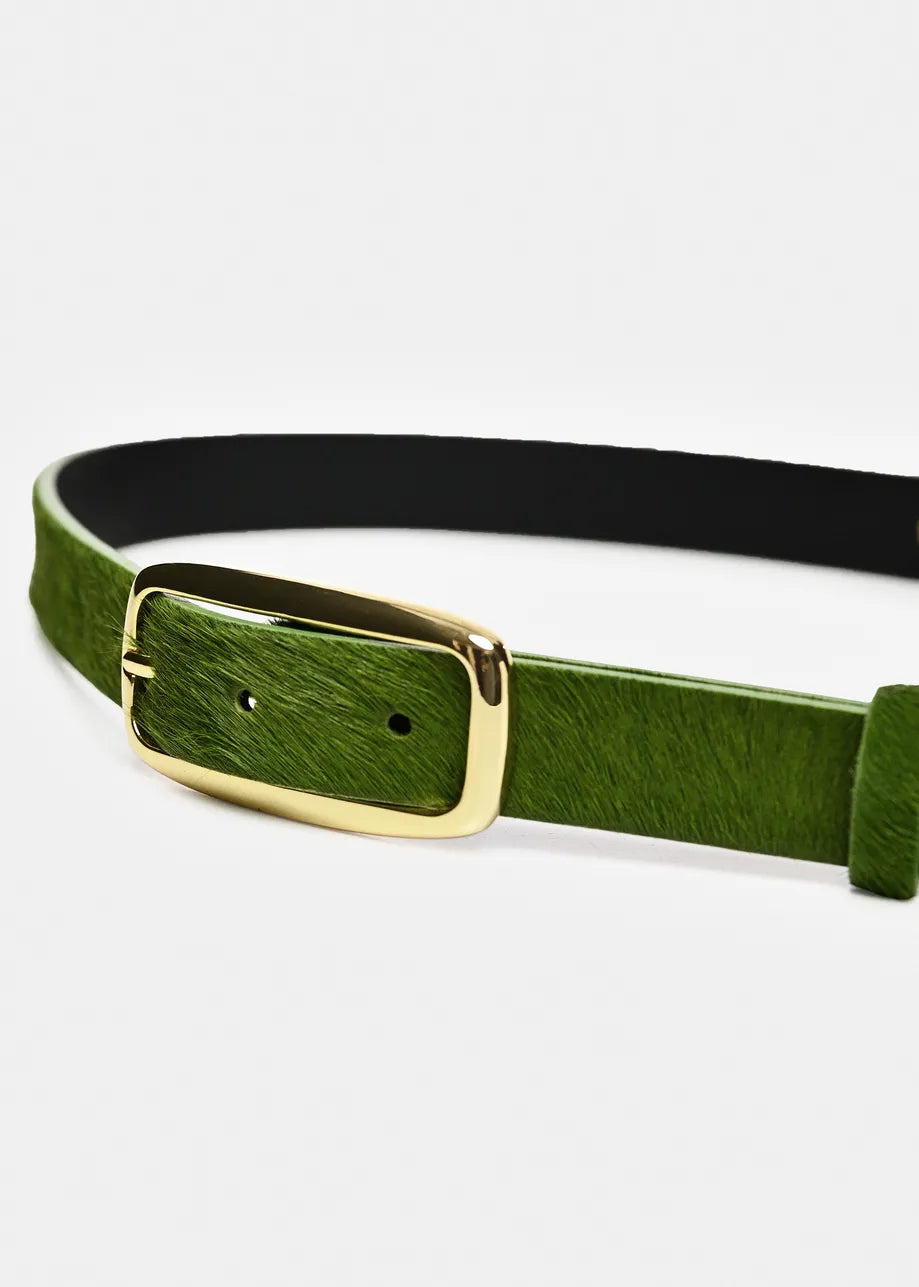 An olive green textured leather belt with a gold buckle and a black inner lining, displayed horizontally on a clean white background.