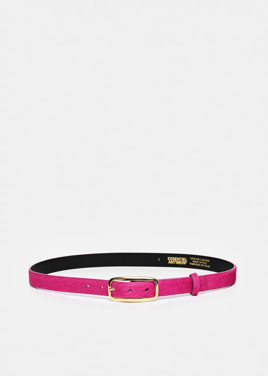 A vibrant magenta pink belt with a gold buckle, displayed horizontally on a light gray background. The inner lining is black with gold branding text.