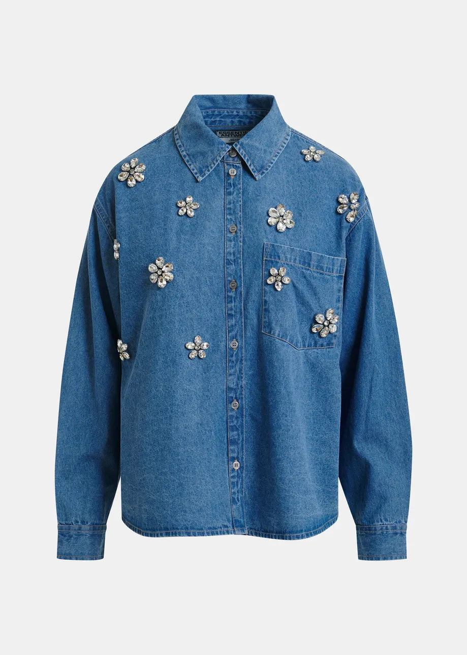 Blue denim shirt with floral embellishments on a white background