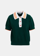 Green polo shirt with a white collar and red buttons on a white background