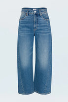 Blue jeans on a light blue background
