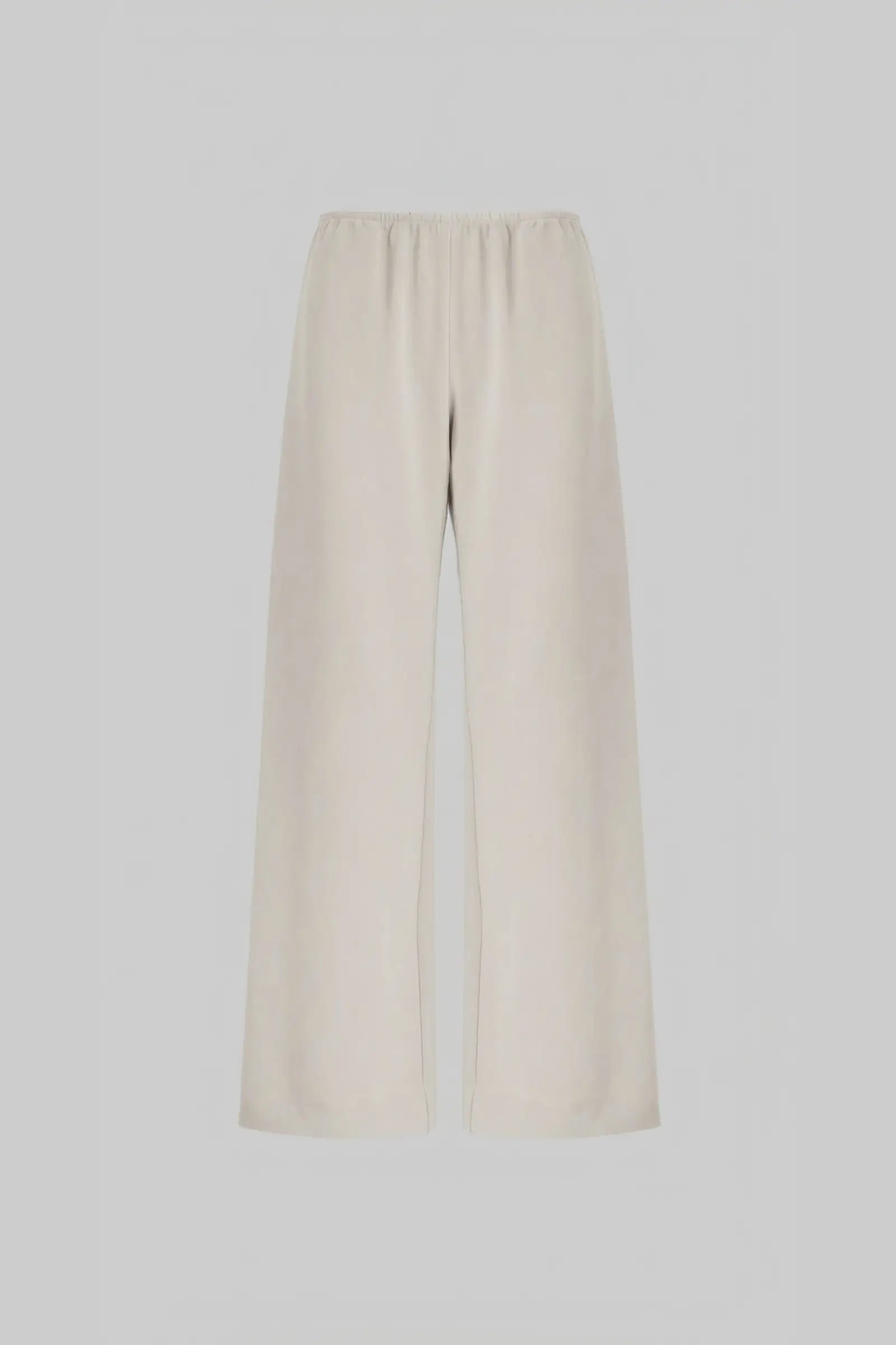 A pair of wide-leg cropped pants in a light cream or off-white color, displayed on a neutral light gray background.