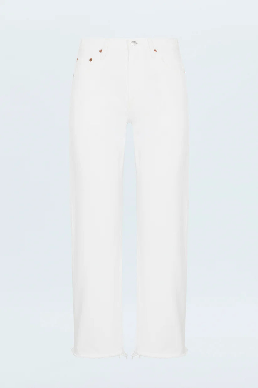 Long, thin, white object with a textured surface on a light blue background